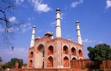 The Tomb of the the third Mughal Emperor Akbar (r. 1556-1605) is an important Mughal architectural masterpiece, built 1605-1613 and set in 48 Ha (119 acres) of grounds in Sikandra, a suburb of Agra, Uttar Pradesh, India.<br/><br/>Emperor Akbar himself commenced its construction around 1600, according to Central Asian tradition to commence the construction of one's tomb during one's lifetime. Akbar himself planned his own tomb and selected a suitable site for it, after his death, Akbar's son Jahangir completed the construction in 1605-1613.<br/><br/>The south gate is the largest, with four white marble chhatri-topped minarets which are similar to (and pre-date) those of the Taj Mahal, and is the normal point of entry to the tomb. The tomb itself is surrounded by a walled enclosure 105 m square. The tomb building is a four-tiered pyramid, surmounted by a marble pavilion containing the false tomb. The true tomb, as in other Mughal mausoleums, is in the basement.<br/><br/>The buildings are constructed mainly from a deep red sandstone, enriched with features in white marble. Decorated inlaid panels of these materials and a black slate adorn the tomb and the main gatehouse. Panel designs are geometric, floral and calligraphic, and prefigure the more complex and subtle designs later incorporated in Itmad-ud-Daulah's Tomb.
